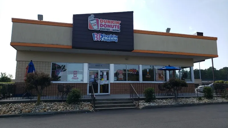 Dunkin Donuts and Baskin-Robbins combo store exterior with outdoor seating area